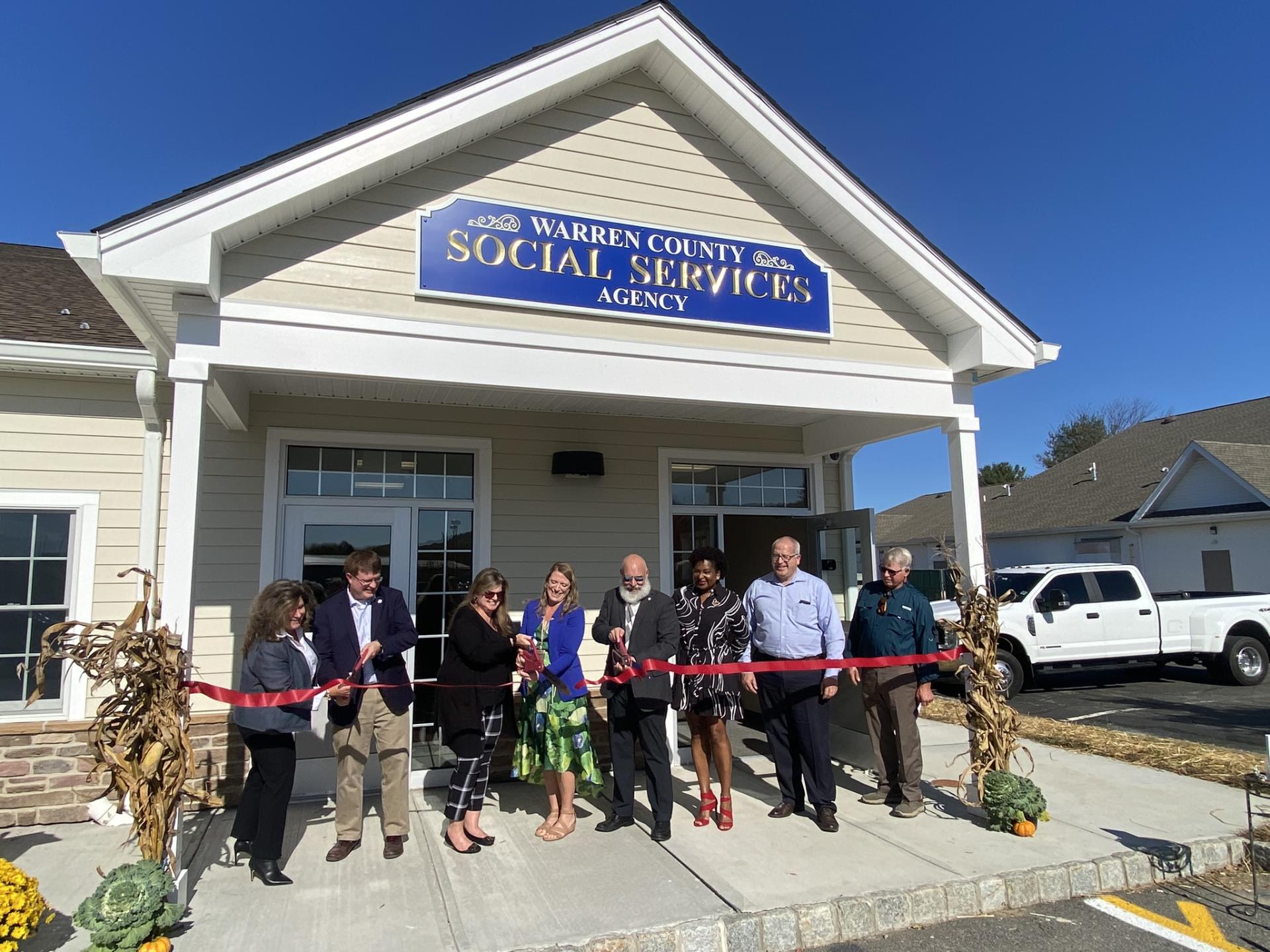 Commissioners Cut Ribbons to Open Two Buildings in One